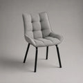 Chaise de salle à manger rembourrée en polyester gris avec pieds en acier noir, 58 × 62 × 86 cm
